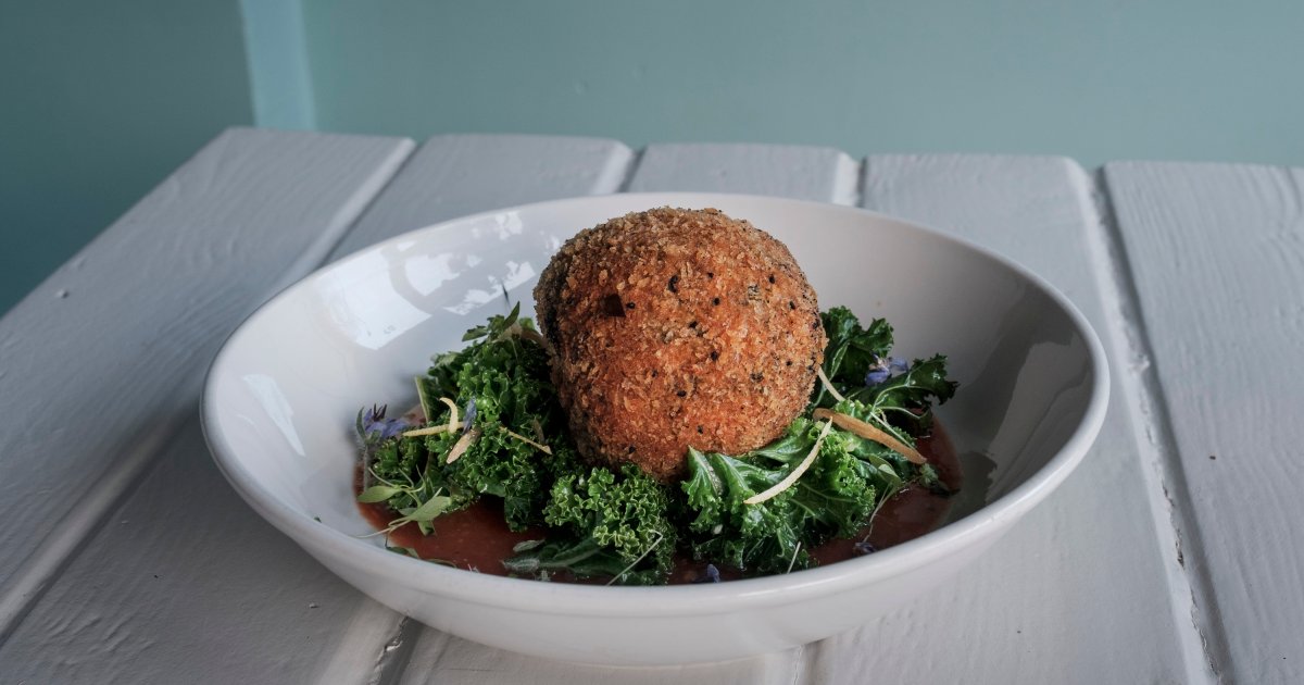 Squid ink Arancini in Bloody Mary sauce