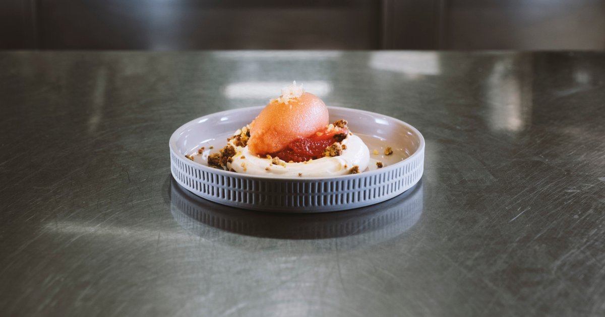 Snøfrisk coconut cream with chocolate crumble and red orange sorbet